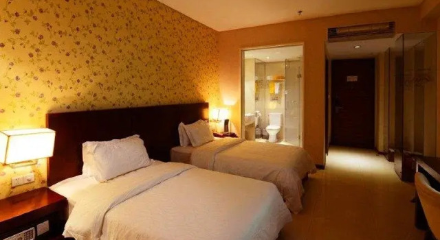 Ming Tien Inn, Rezerwuj Hotel Hotele 3-gwiazdkowe w Zhaoqing, 3*
