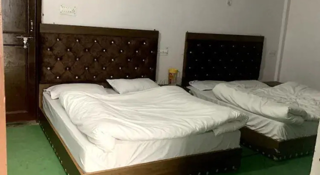Четырёхместный номер Deluxe New Siddharth Hotel Joshimath