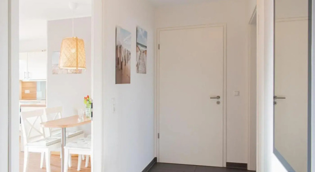 Ferienwohnung Stranddüne B 13, Забронировать Отель Шарбойц Holstein Switzerland, рядом с Пляж Hundestrand