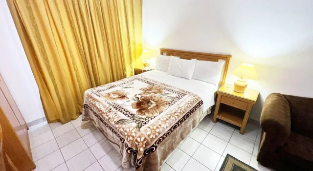 Студия Delmon Suites