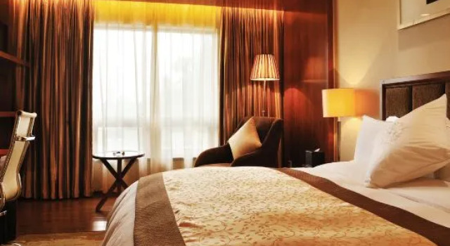 Номер Deluxe Hentique Huijin Resort Hotel