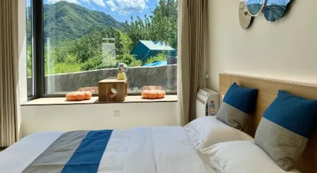 Кровать в общем номере Beijing Ronghexiang Homestay