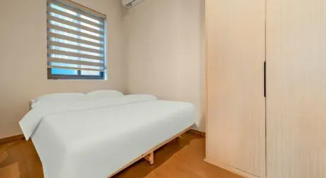 Семейный люкс с 2 комнатами shutongxiaolouyangshengliaoyu Hotel (Xiamen Gaoqi Airport Branch)