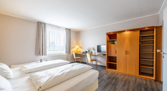 Трёхместный номер Comfort PLAZA INN Zwickau