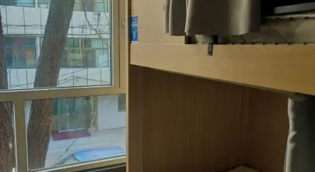 Кровать в общем номере (мужской номер) Kunyuyunshe Homestay