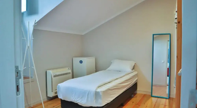 Кровать в общем номере Casa Gaea Stay