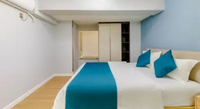 Люкс с 3 комнатами Chengdu Hexi Apartment (Huanhuahui East Railway Station Branch)
