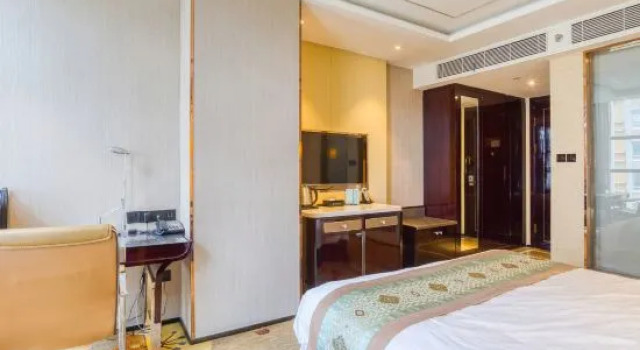 Suite Caifu Traders Hotel