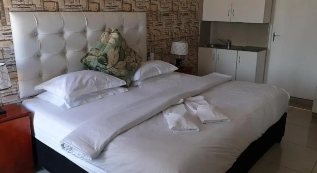 Апартаменты RJs Guesthouse