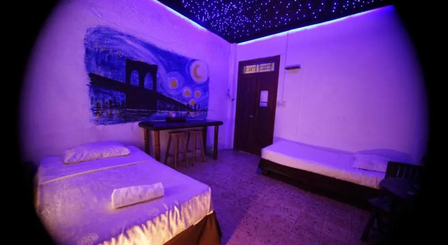 Кровать в общем номере Manso Boutique Guesthouse