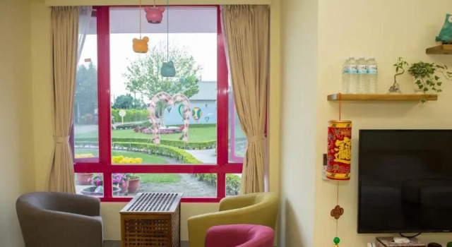 Четырёхместный номер Standard с видом на сад XinFu Traveler Inn