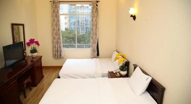 Трёхместный семейный номер Standard Minh Tam Hotel and Spa