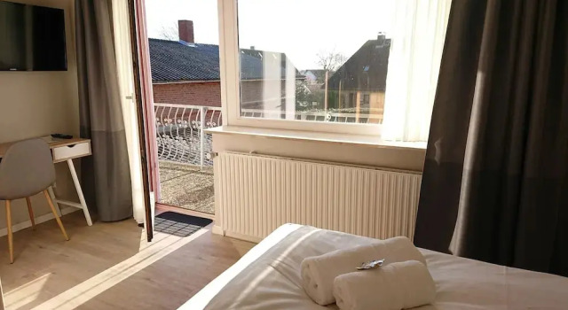 Номер Comfort с балконом и с видом на сад Ostseehotel Kappeln by team SchleiFee