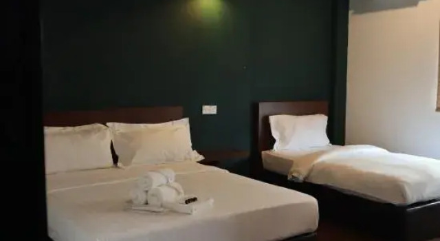 Трёхместный люкс Kluang Parade Hotel