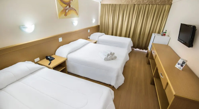Четырёхместный номер Executive Hotel Nacional Inn Poços de Caldas - Lazer completo e Gastronomia no Centro