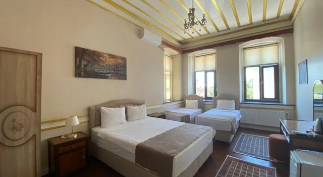 Standardowy czteroosobowy rodzinny pokój Oasis Pansiyon Hotel