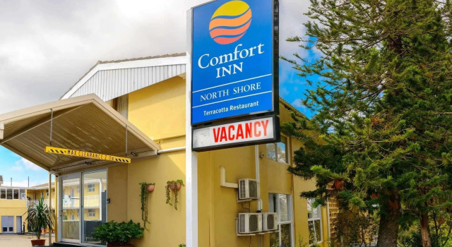 Кровать в общем номере Comfort Inn North Shore Hotel