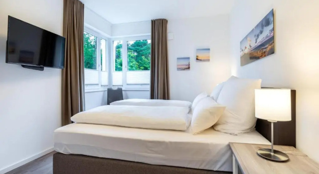 Aparthotel Ostseeallee Aparthotel Ostseeallee 1-07, Забронировать Отель Отели Больтенхаген с бассейном, Бассейн