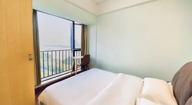 Люкс с 3 комнатами с видом на реку HaiYiZhenPin Apartment