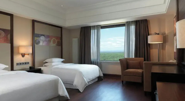 Четырёхместный номер Standard с балконом Sheraton Changbaishan Resort