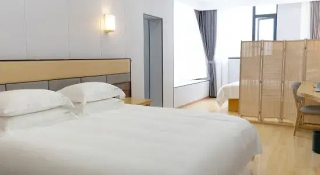 Люкс Business Xiaoduo Hotel (Leshan Wutongqiao Branch)