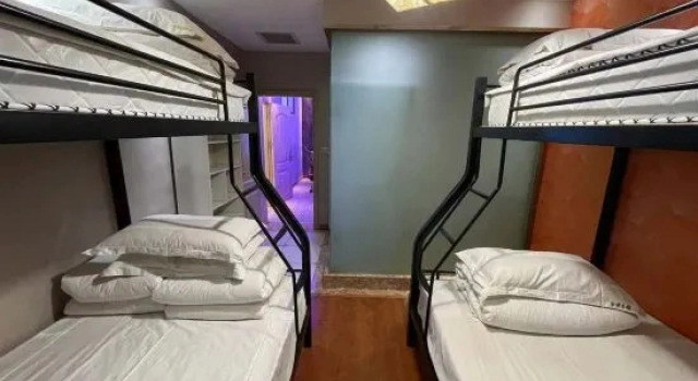 Кровать в общем номере Sheqi Jinyuan Electric Sports Hotel