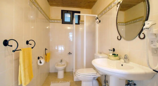 Коттедж c 1 комнатой с видом на сад Villa Scozilia