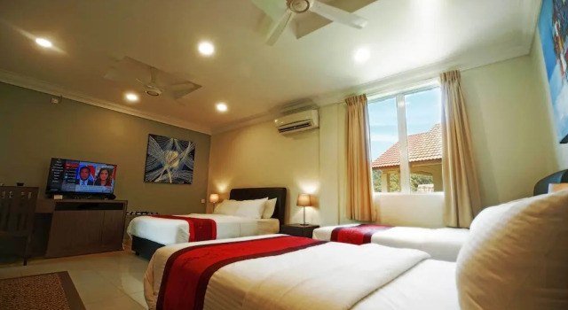 Четырёхместный номер Deluxe с балконом Tioman Dive Resort