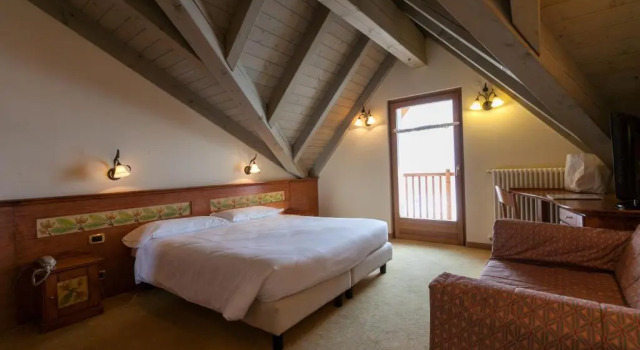 Четырёхместный номер Deluxe Hotel Delle Alpi