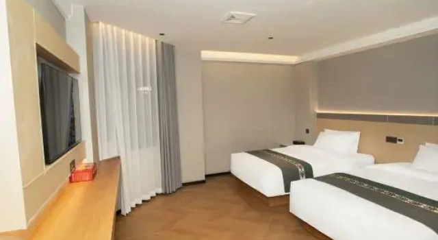 Люкс Deluxe Baowan Business Hotel (Xiushui Liansheng Shopping Plaza)