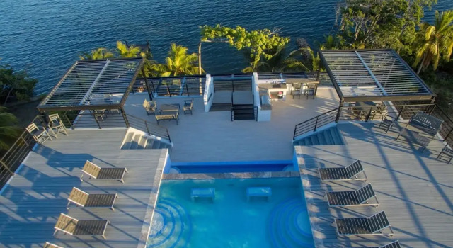 Апартаменты Sunset Gecko - Beachfront Condo Complex In Placencia Village
