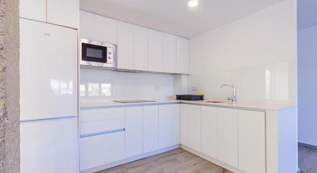 Апартаменты Amplio y acogedor apartamento renovado con piscina AL124