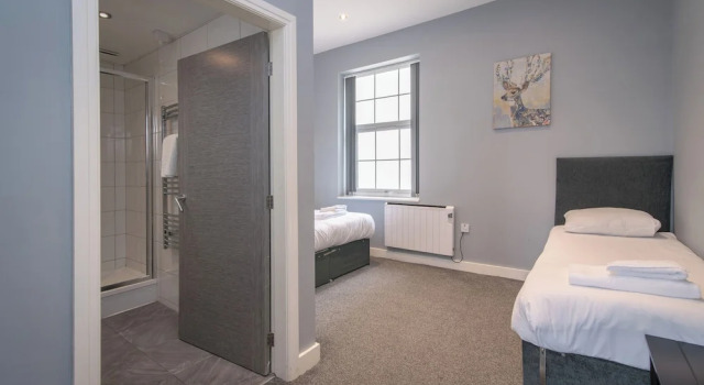 Апартаменты Arena Apartments - Stylish and Homely Apartments by the Ice Arena with Parking