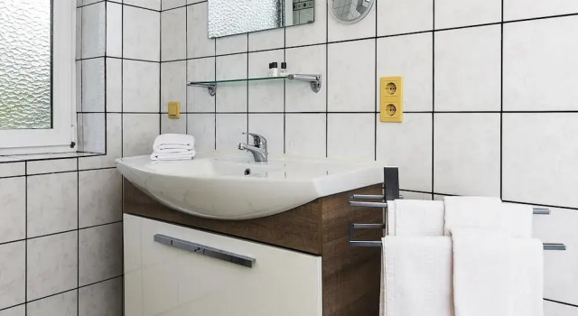 Апартаменты Gemuetliche Ferienwohnung mit Wintergarten, Bensersiel