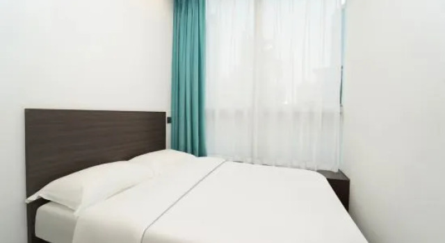 Четырёхместный люкс с 2 комнатами Banyueli Hotel