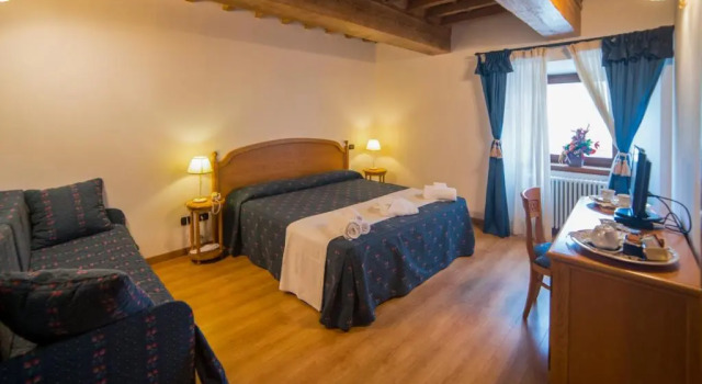 Четырёхместный номер Standard HG Abetone e Piramidi Resort