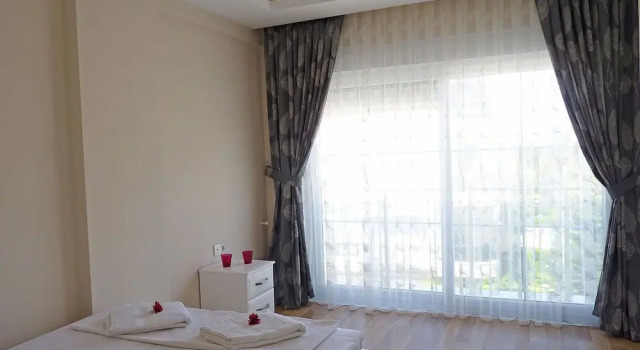Апартаменты с 3 комнатами с балконом и с красивым видом из окна White Star Antalya