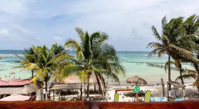 Четырёхместный номер Superior с балконом и с видом на море Quinto Sole Boutique Hotel Mahahual