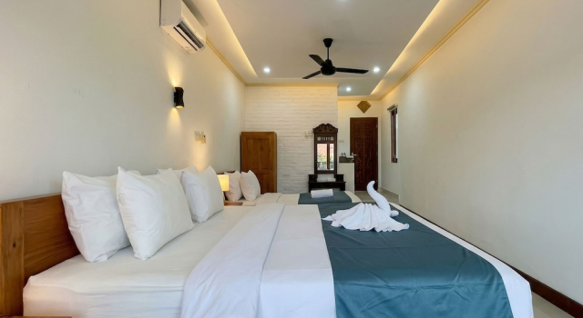 Номер Deluxe Rumah Rini by Rumah Weda