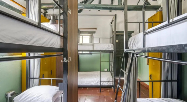 Кровать в общем номере Hotel Aceitunos
