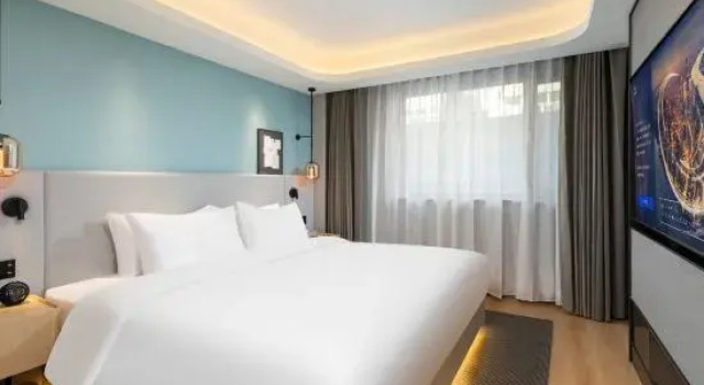 Люкс Country Inn & Suites by Radisson Hotel (Mudanjiang Station East Pedestrian Street)
