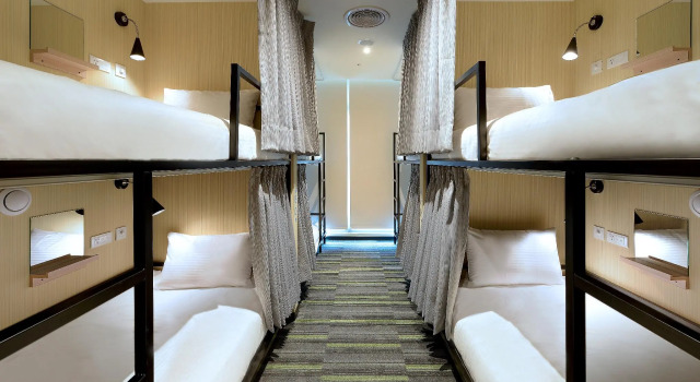 Кровать в общем номере Park City Inn & Hostel