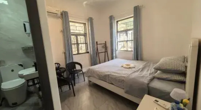 Люкс с балконом Xinsu Homestay (Judiaosha Yangmeikeng)