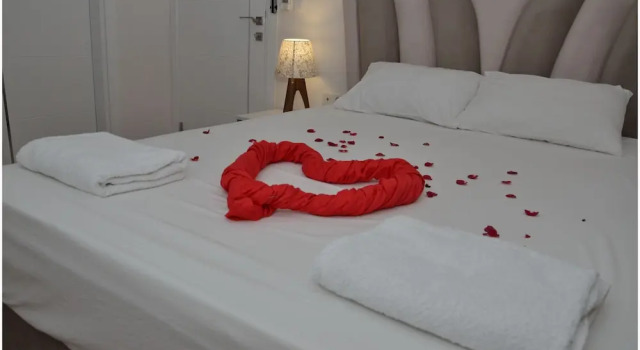 Семейные апартаменты с балконом и с видом на гавань Sigacik Marina Apart Hotel