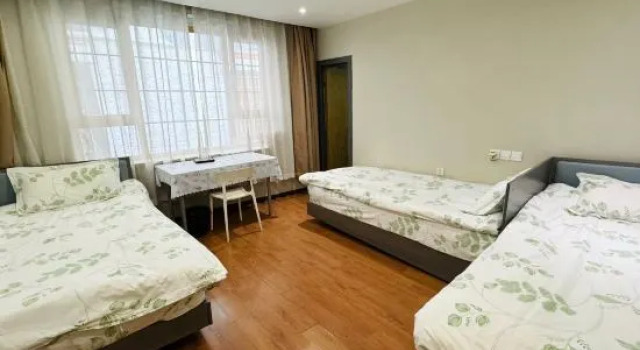 Standardowy trzyosobowy pokój Fengma Feiyang Hostel