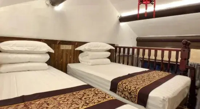 Трёхместный люкс Дуплекс Beijing Zhaixiang Fuyuan Inn