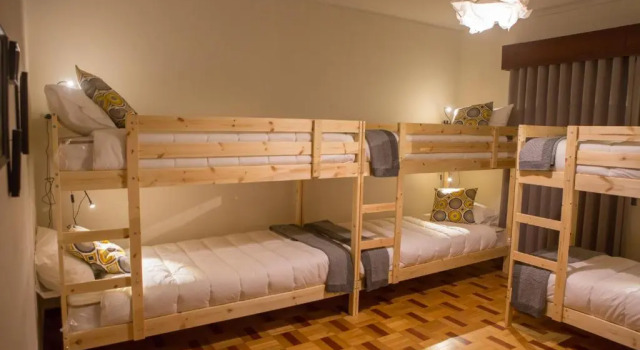 Кровать в общем номере Hospedagem Casa das Regadas