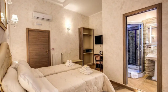 Номер Deluxe AMICI GUESTHOUSE