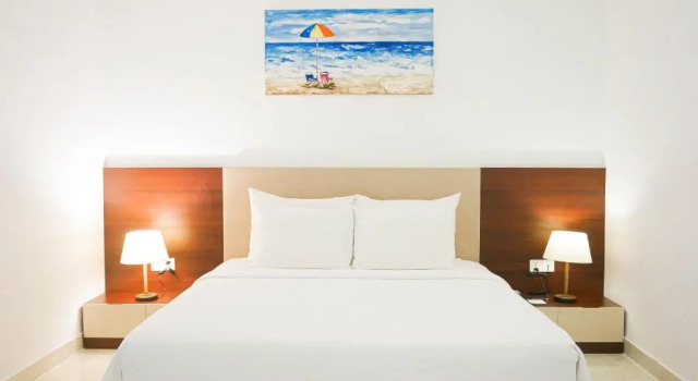 Номер Standard с 2 комнатами с балконом и с видом на сад CostaBella Resort Nha Trang