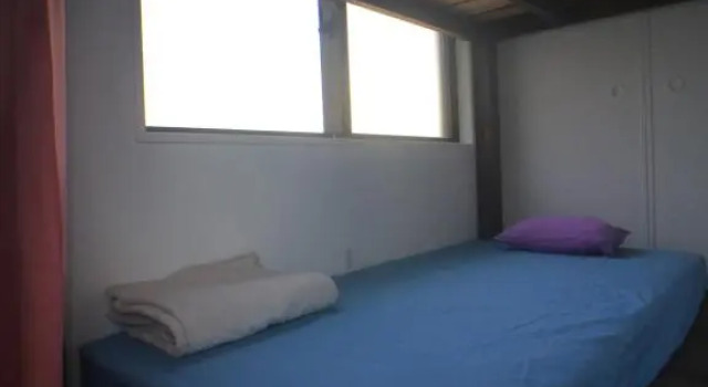 Postel ve společném pokoji guesthouse ayaguya - Hostel